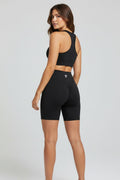 Stryvn black high-waisted blend shorts with ruched detailing and a sculpting fit for performance.