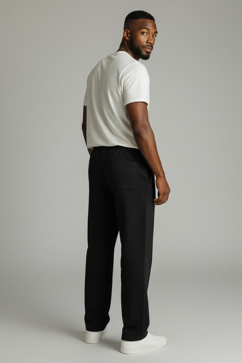Stryvn black straight-leg sweatpants with two back pockets and a comfortable elastic waistband.