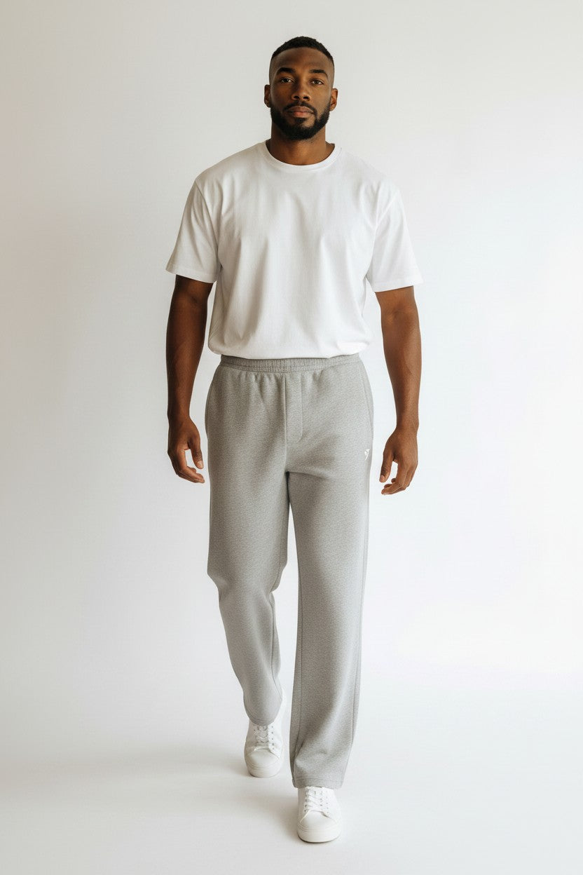 Stryvn grey cotton blend straight-leg sweatpants with elastic waistband and subtle logo detail.