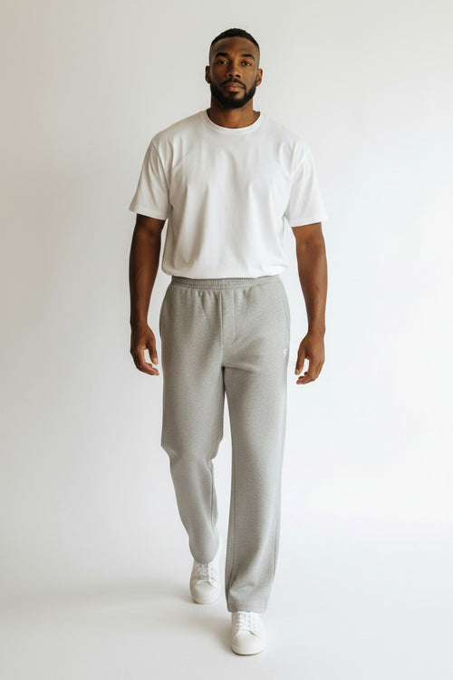 Stryvn grey cotton blend straight-leg sweatpants with elastic waistband and subtle logo detail.
