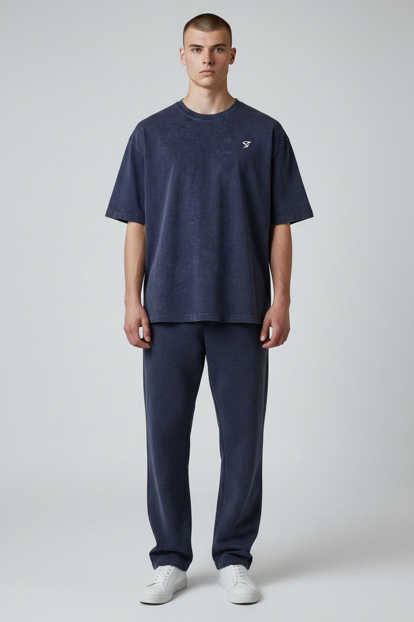 Stryvn navy blue oversized cotton t-shirt with a vintage wash and embroidered logo.