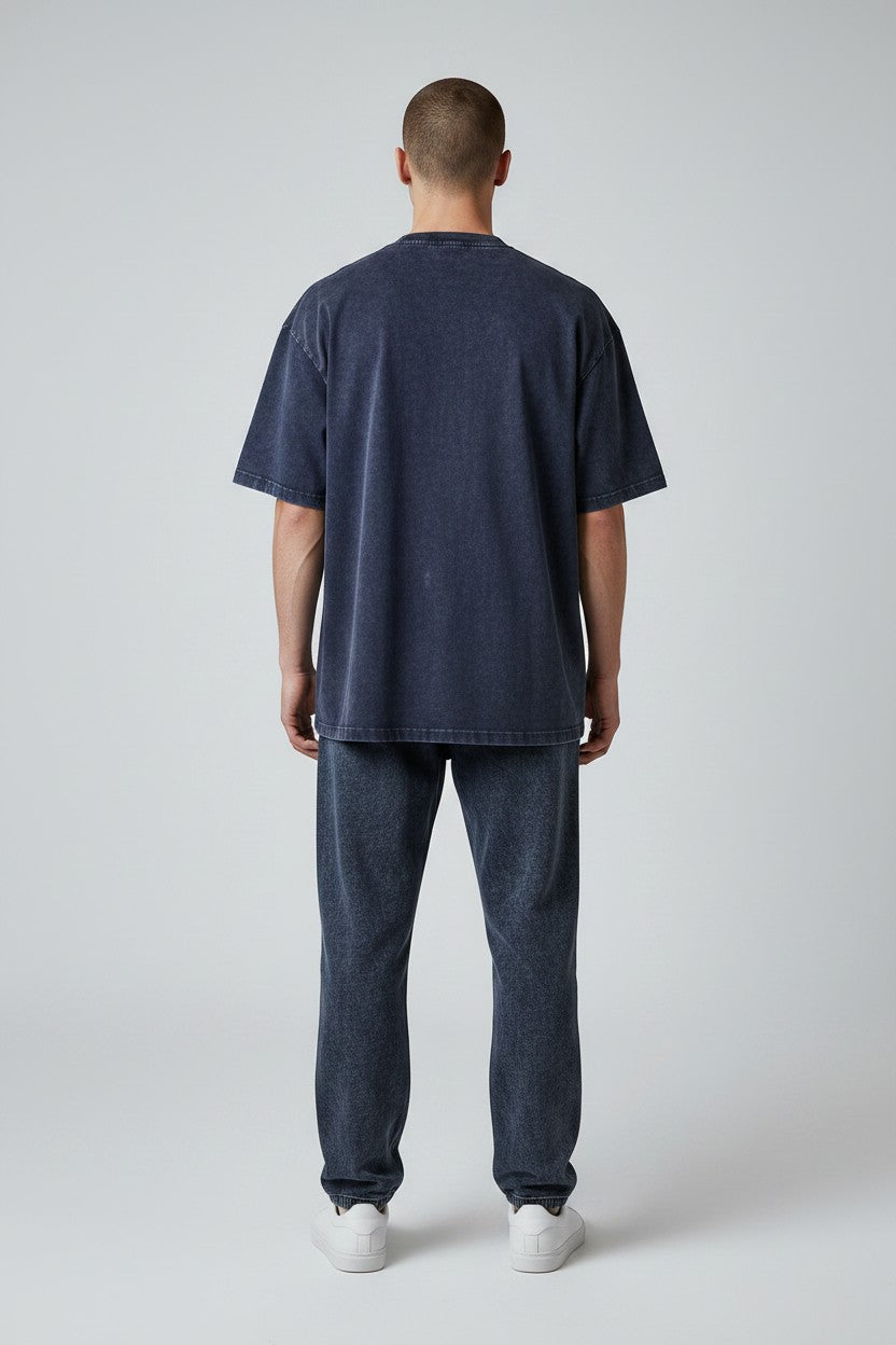 Stryvn Core Oversized Cotton T-Shirt in dark navy with a washed effect. Relaxed fit, crew neck, short sleeves.