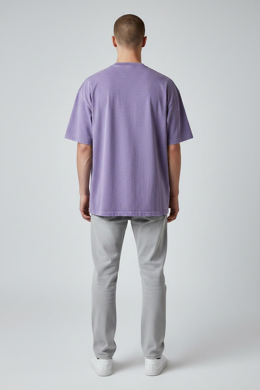 Stryvn Core oversized cotton t-shirt in a washed purple hue. Relaxed fit for everyday performance and comfort.