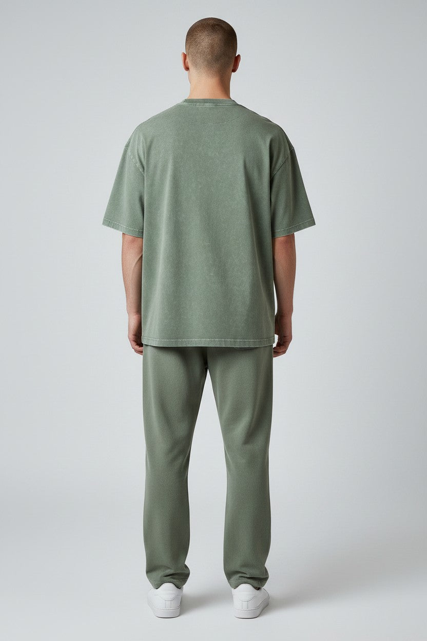 Stryvn oversized sage green cotton t-shirt with a relaxed fit and vintage wash.